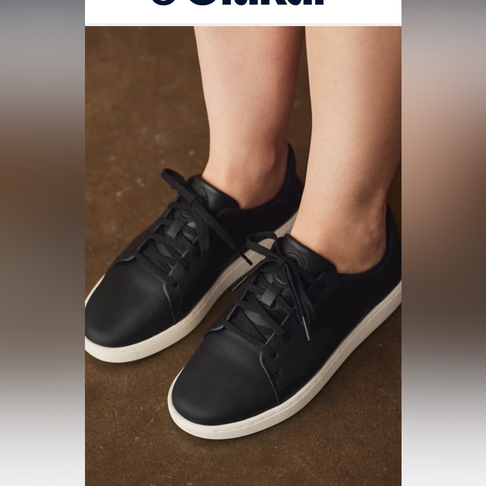 Olukai black pehuea li ili womens leather size 7 
Black Leather Women's Sneakers